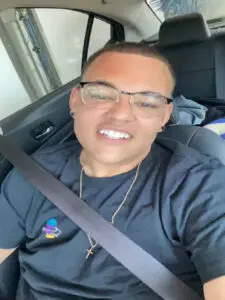 black guy inside car selfie